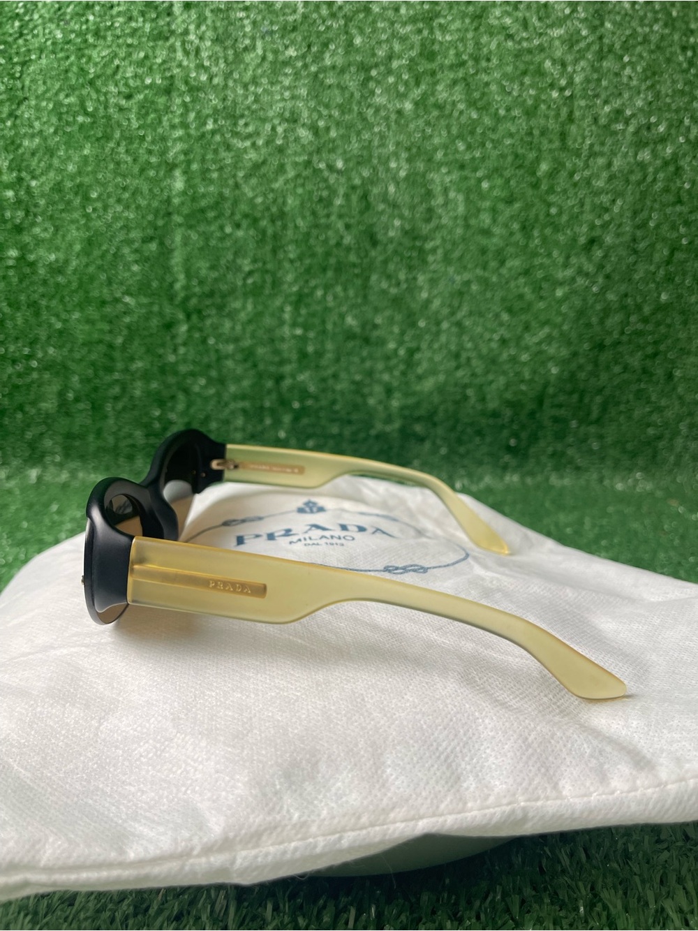 Prada Two-Tone Cat Eye Sunglasses in Black and Yellow - Picture 2 of 15